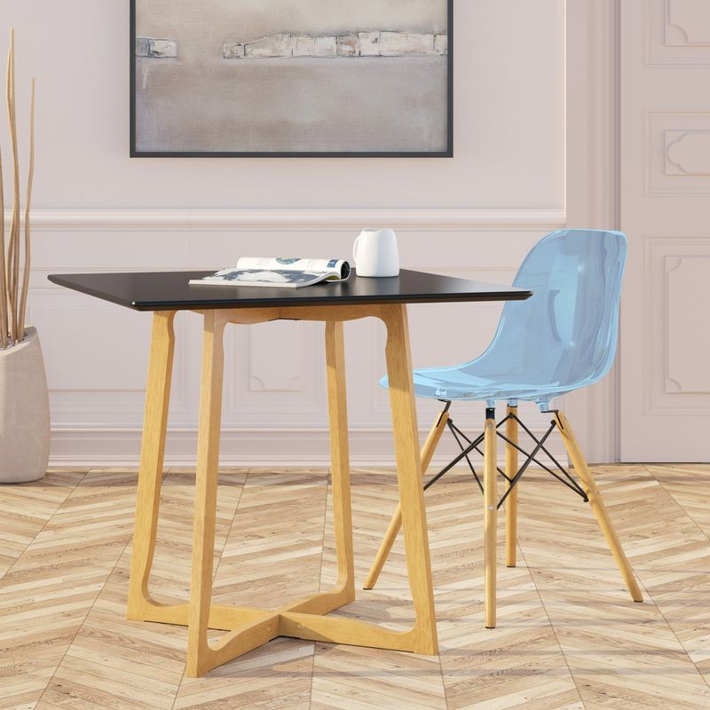 LeisureMod Dover Plastic Molded Dining Side Chair Transparent Blue at Table.
